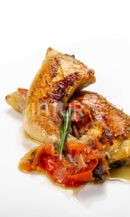 Cuartos traseros de pollo asado